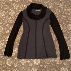 Laura Hlavac gray top w/ sheer long black sleeves